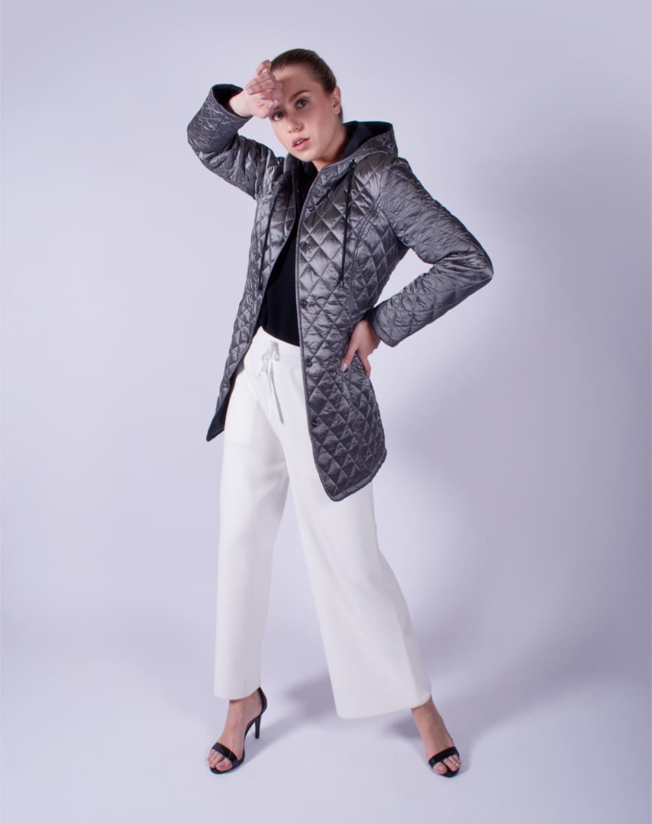Capitoned jacket with hat