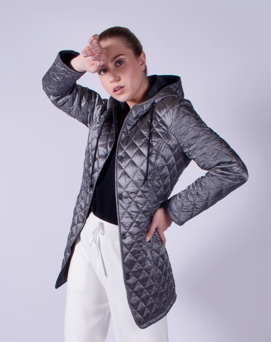 Capitoned jacket with hat