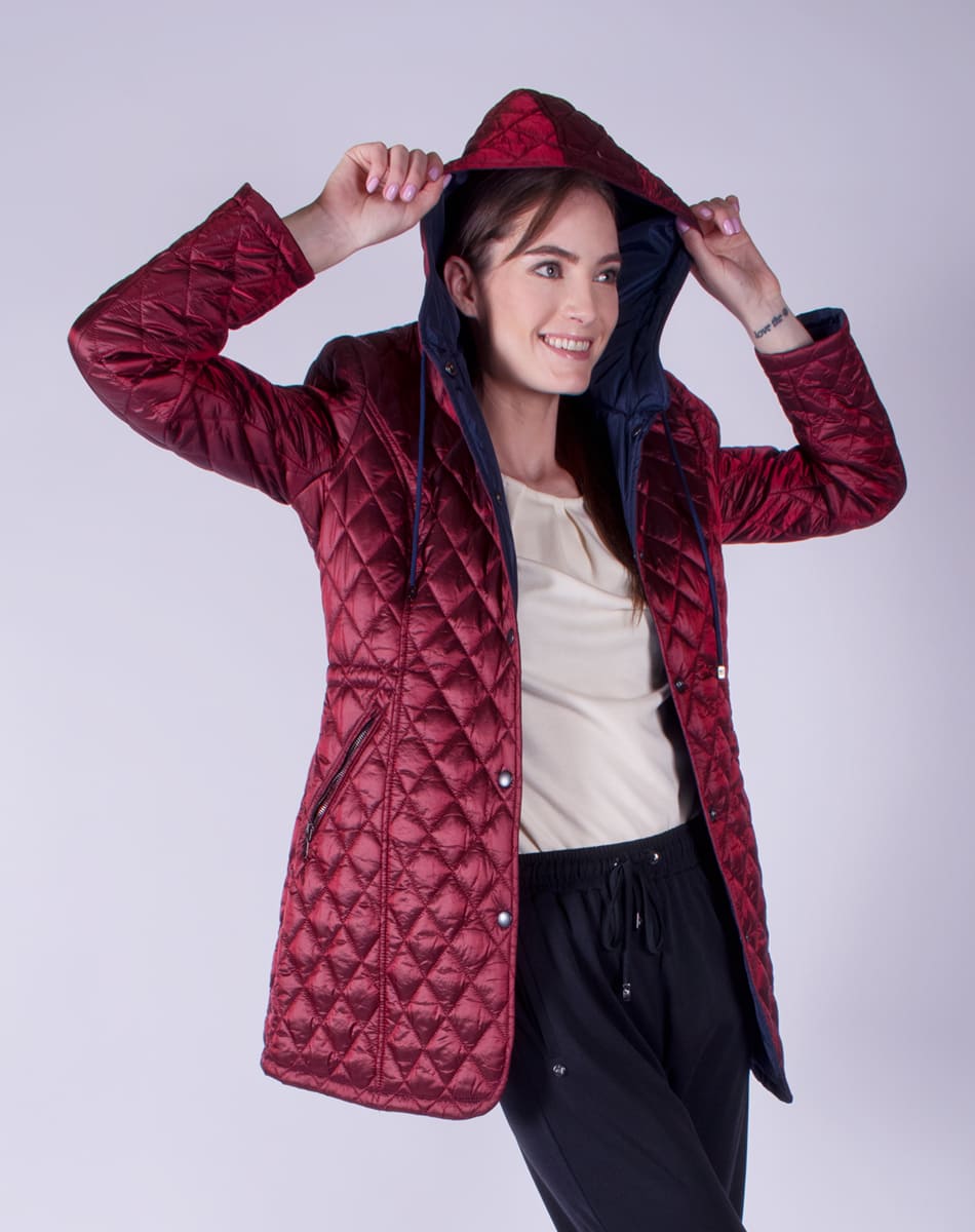 Capitoned jacket with hat