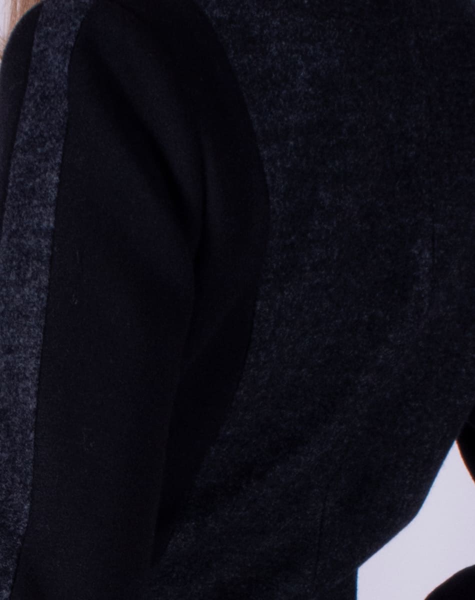 Coat with asymmetrical front